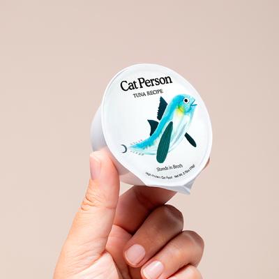 Comida húmeda para gatos Cat Person de Weruva Tuna Flakes in Broth sin cereales, taza de 2.75 oz, caja de 5